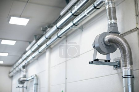 Photo for Air flow system in a modern building of a car workshop - Royalty Free Image