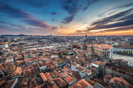 Sunset seen from bell tower of Clerigos Church in Porto city, Portugal