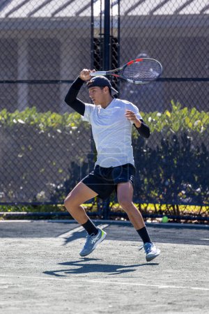 Photo for Colombian tennis player Juan David Velasquez plays during the Midtown Weston Future MT tennis tournament at Weston, FL on February, 13th 2023 - Royalty Free Image