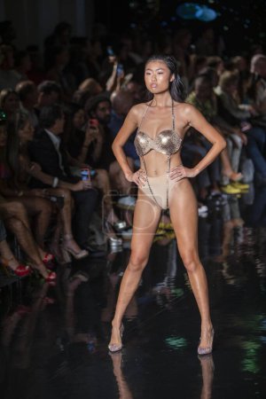 Téléchargez les photos : A model walks the runway for the House of Skye Sexy Black Bra Fashion Show during Art, Hearts, Fashion Swim Week at the Faena Forum in Miami Beach on 7- 11- 2021 - en image libre de droit