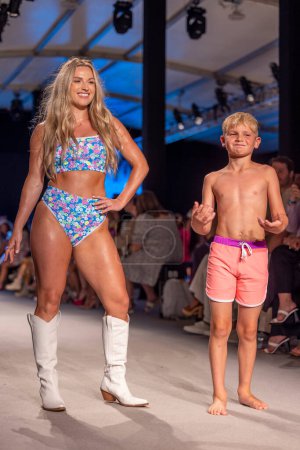 Photo for A model walks the runway during LainSnow swimwear fashion Show at the Paraiso ten in Miami Beach, FL on June 8th, 2023 - Royalty Free Image