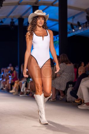 Photo for A model walks the runway during LainSnow swimwear fashion Show at the Paraiso ten in Miami Beach, FL on June 8th, 2023 - Royalty Free Image