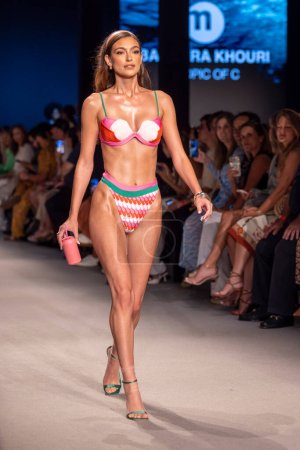 Photo for A model walks the runway during Instituto Marangoni upcycle swimwear fashion Show at the Paraiso ten in Miami Beach, FL on June 9th, 2023 - Royalty Free Image