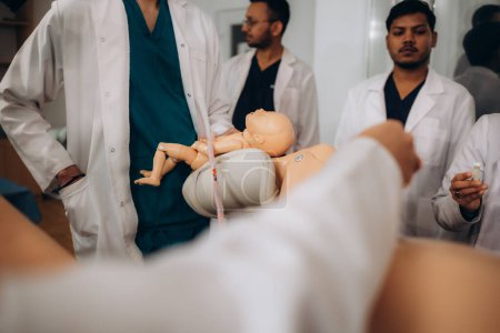 obstetrician-gynecologist student at a practical session