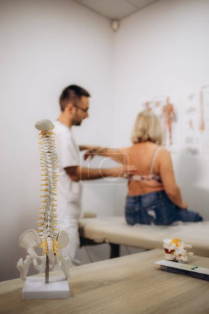 senior woman at the spine specialist