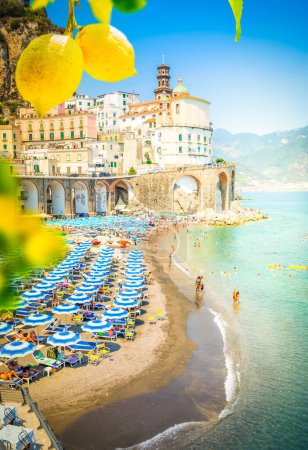 Photo for Amalfi old town and summer Atrani beach with umbrellas , Italy - Royalty Free Image