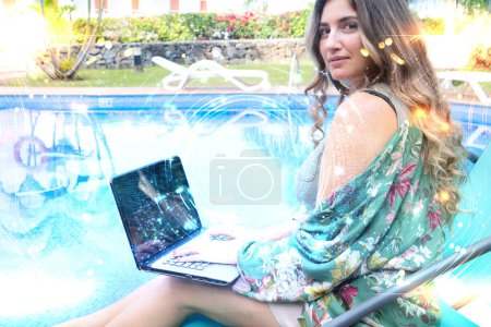 Photo for Woman working or studing online in relaxed ambient, happy woman using modern laptop computer near pool while remote working or playing - Royalty Free Image