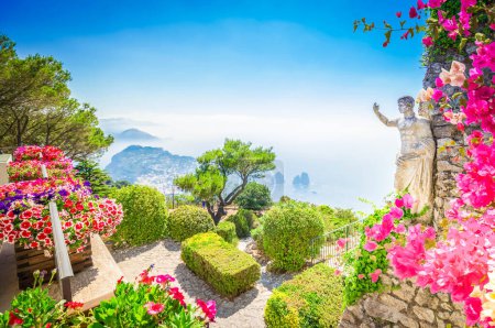 View from mount Solaro of Capri island at summer day with flowers, Italy