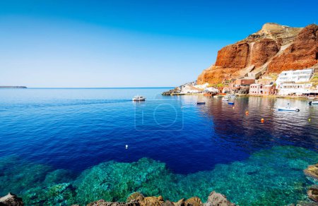 Amoudi bay with refreshing water, port of Oia, Santorini Greece at summer