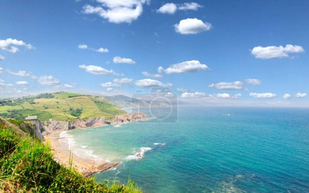 panorama of Itzurun beach and hills of Zumaia coast, Pais Vasco Spain