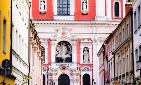 Photo for Poznan Fara - Roman Catholic basilica. Old beautiful building facade with statues in historical Poland city in Europe. - Royalty Free Image