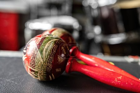 Photo for Colorful maracas for hispanic music on table in recording studio closeup. Traditional shaking musical instrument for ethnic perfomance - Royalty Free Image