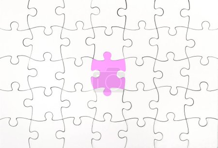 Photo for Top view of white jigsaw puzzle - Royalty Free Image
