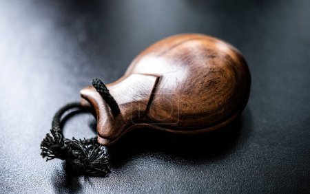 Photo for Wooden castanet for flamenco dance closeup. Traditional hispanic musical instrument for live perfomance - Royalty Free Image