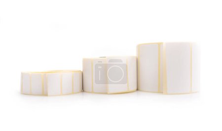 Téléchargez les photos : Barcode sticker rolls set isolated on white background. Blank adhesive empty labels. Paper tags for marking and identification - en image libre de droit