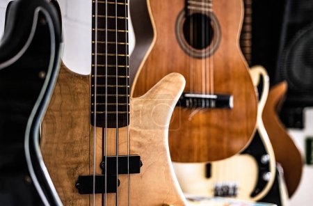Photo for Bass guitar fretboards and strings in music recording studio closeup. Musical instrument for live acoustic perfomance - Royalty Free Image