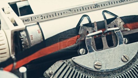 Photo for Vintage typewriter with with empty paper, close up view - Royalty Free Image