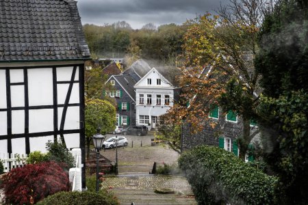 Photo for View From the Stair on a Historical Marketplace square In Solingen Graefrath with haze - Royalty Free Image