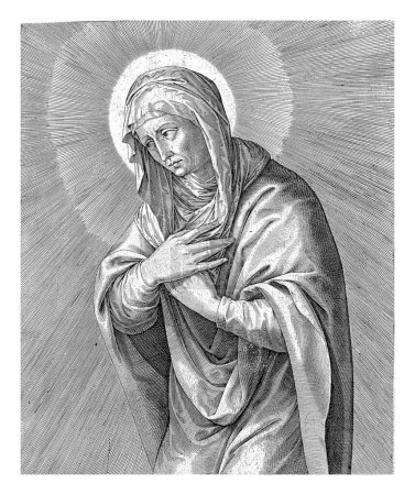 Foto de La afligida María, con los brazos cruzados delante de su pecho. En el margen una cita bíblica de Luc. 1 en latín. - Imagen libre de derechos