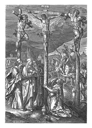 Téléchargez les photos : Crucifixion du Christ, Crispijn van de Passe (I), d'après Maerten de Vos, 1574 - 1637 La crucifixion du Christ sur le Mont Calvaire. A sa gauche et à sa droite, les criminels crucifiés avec lui. - en image libre de droit