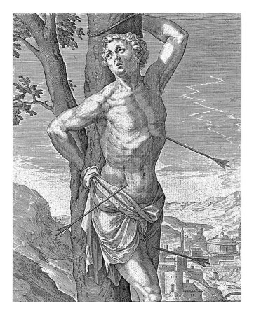 Téléchargez les photos : S. Sebastian, Antonie Wierix (II), d'après Hieronymus Wierix, 1565 - avant 1604 Saint Sébastien est attaché à un arbre. Des flèches lui ont percé le corps. En arrière-plan une vue d'une ville. - en image libre de droit