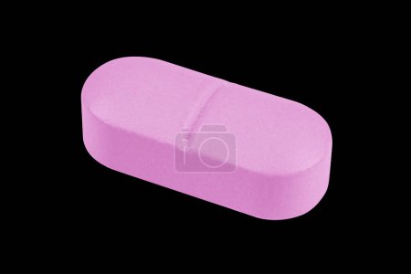 Photo for Macro shot pink tablets pill isolated on black background. Pharmacy products. Medicine pills and drugs close up. Health care. Pills background - Royalty Free Image