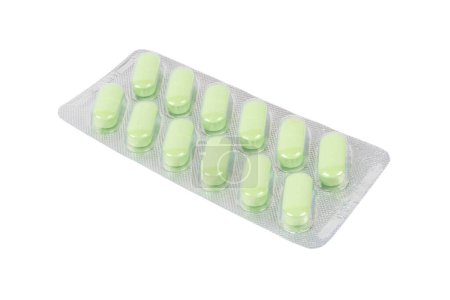 Photo for Macro shot pile of green tablets pill in blister packaging isolated on white background. Aluminium foil blister pack. Medicine pills and drugs close up. Health care. Pills background - Royalty Free Image