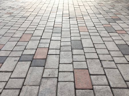 Photo for Sidewalk tiles. Closeup of paving slabs background. Street paving slabs. Cement block of the road. Cement brick squared stone floor background. - Royalty Free Image