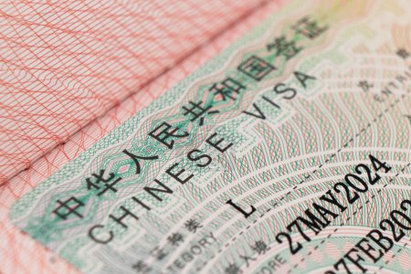 Fermer Visa chinois est approuvé. Visa appliqué dans le passeport pour voyager en Chine
