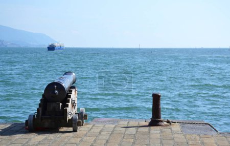 Photo for Old cannon near the seashore in La Spezia harbor - Royalty Free Image