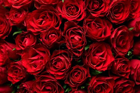 Foto de Texture of bouquet of red roses flowers - Imagen libre de derechos