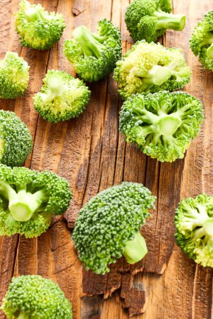 Photo for Broccoli still life over wooden background - Royalty Free Image