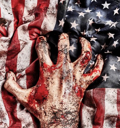 Foto de Bloody hand of soldier with flag of United States of America. War concept. Protecting of democracy - Imagen libre de derechos