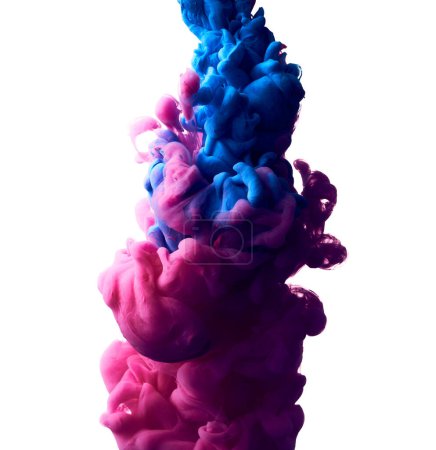 Foto de Foto de salpicadura de pintura azul y rosa en agua sobre fondo blanco - Imagen libre de derechos