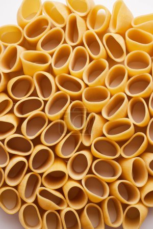 Téléchargez les photos : Cuisine italienne pâtes texture alimentaire fond - en image libre de droit