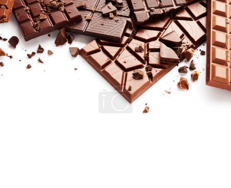 Foto de Montón de barra de chocolate aislado sobre fondo blanco - Imagen libre de derechos
