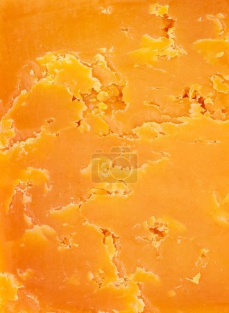Foto de Delicioso queso cheddar textura de fondo - Imagen libre de derechos