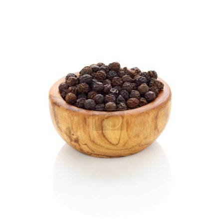 Photo for Black pepper in wooden bowl isolated on white background - Royalty Free Image