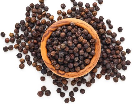 Photo for Top view of black pepper in a wooden bowl - Royalty Free Image