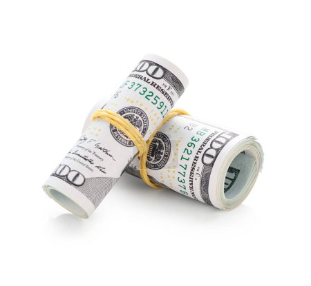 Foto de Cien billetes de dólares en efectivo rollos aislados sobre fondo blanco - Imagen libre de derechos