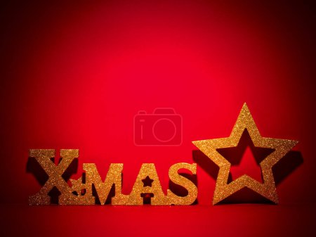 Photo for Christmas and New Year red holiday background with golden glitter star - Royalty Free Image