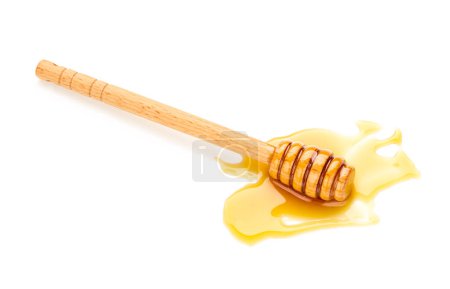 Téléchargez les photos : Miel avec trempette au miel isolé sur fond blanc - en image libre de droit