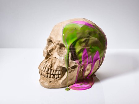 Photo for Paints running down the human skull abstract background - Royalty Free Image