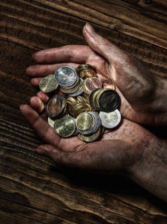 Photo for Hand holding a euro cents coins - Royalty Free Image