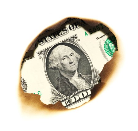 Foto de Fondo concepto de ahorro quemado. un dólar de papel en el agujero - Imagen libre de derechos