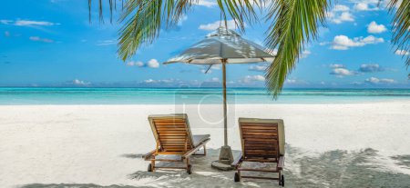 Photo for Sunbeds with umbrella on clear seashore - concept of luxurious vacation - Royalty Free Image