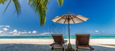 Photo for Tropical seashore with cozy spot for sunbathing - Royalty Free Image