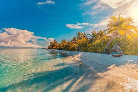 Amazing nature, pristine beach with palm trees sunset moody sky. Summer vacation travel holiday background concept. Maldives paradise beach. Luxury travel summer holiday, idyllic romantic destination