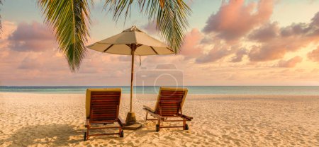 Photo for Beautiful tropical beach banner. White sand and coco palm leaves travel tourism wide panorama background concept. Amazing beach landscape couple chairs umbrella. paradise shore coast nature background - Royalty Free Image