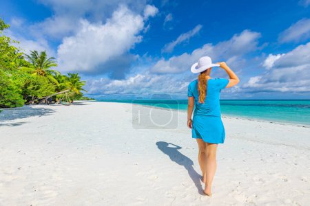 Photo for Young beautiful woman on a tropical beach. - Royalty Free Image